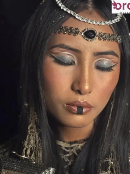 The complete look with costume and props, showcasing the storytelling aspect of fantasy makeup.
