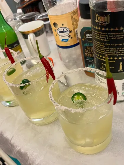 Our Picante cocktail, garnished with a fresh chili. This drink has the perfect kick for those who like a little spice.