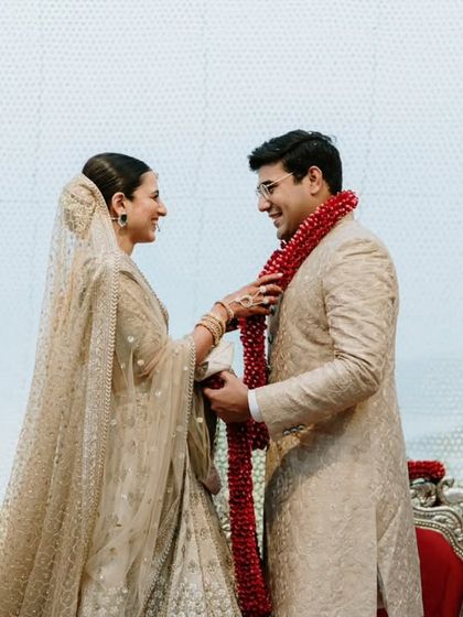 The varmala exchange, a moment of pure happiness and celebration, perfectly captured.