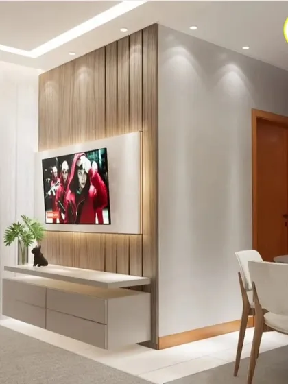 A close-up of the floating TV console with a wood-paneled background. The backlighting adds depth and highlights the texture of the wood, making it a stylish focal point.