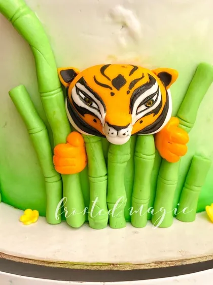 A close-up of the Tigress figurine, showing the detailed stripes and eyes.
