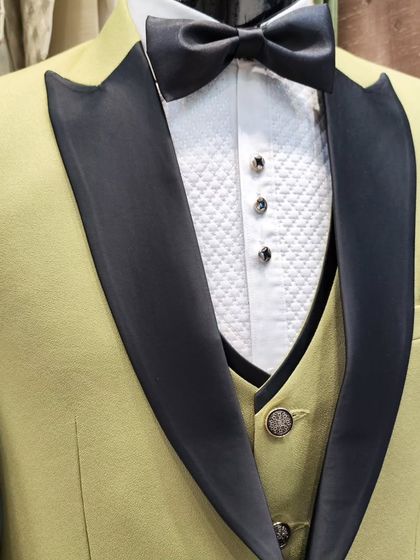 A collection of our designer suits, showcasing a variety of colors, fabrics, and custom details like embroidery, unique lapels, and accessories. Each piece is crafted to make a lasting impression.