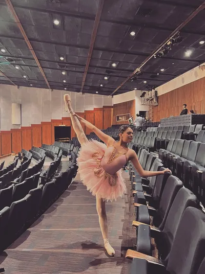 A stunning pose in the auditorium. We use every part of the theater as our creative playground during show week.