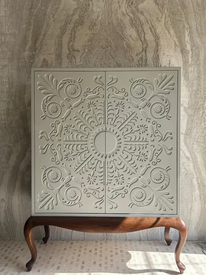 Introducing our latest home bar design. This cabinet style bar features intricately carved doors, standing on elegant cabriole legs, blending artistry with functionality.