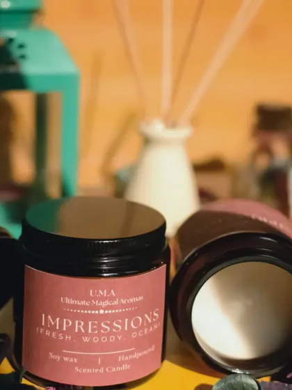 My 'Impressions' scented candle, a fine fragrance with notes of fresh, woody, and ocean. A good-smelling home brings coziness and positivity.