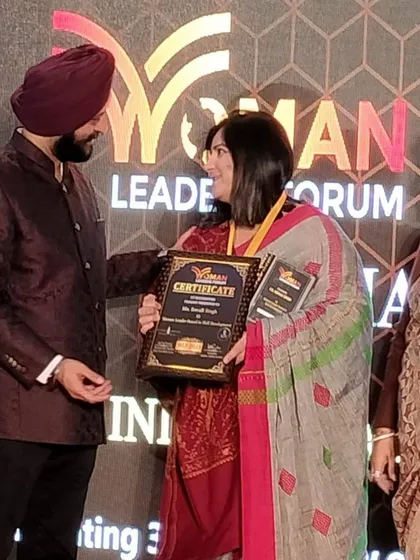 A proud moment, receiving my certificate at the Woman Leaders Forum. This recognition fuels my passion to continue empowering women on their journey.