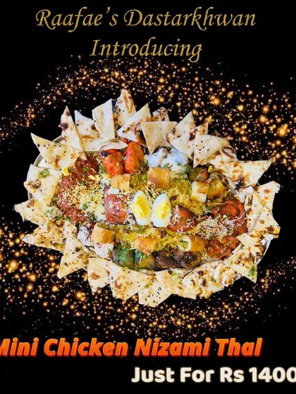 Introducing the Mini Chicken Nizami Thaal, a complete and affordable meal for 2 to 4 people. It's packed with starters, biryani, and naan, offering a taste of my grand thaals in a smaller portion.
