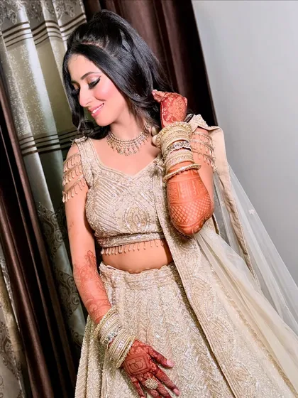 Candid moments are the best. This engagement look was designed to be picture-perfect from every angle, with a focus on flawless skin and sparkling eyes.