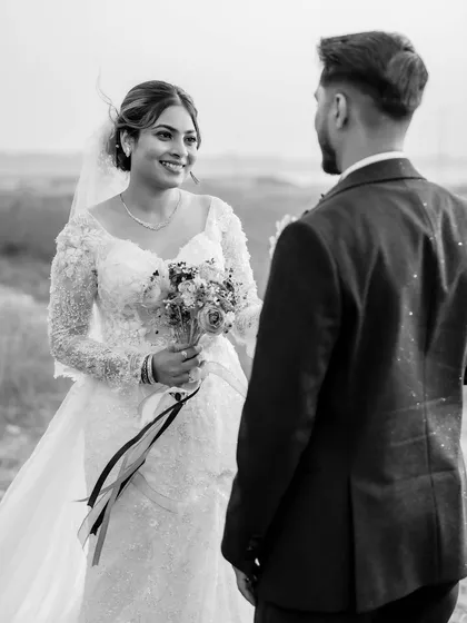 A classic black and white photo capturing the couple's connection.