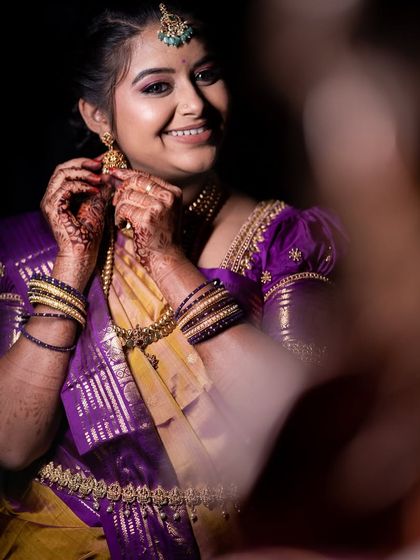 A candid moment of Varshini getting ready. Her smile shows how happy and comfortable she feels.