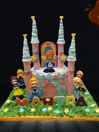 A cake fit for royalty, this large castle design features multiple Disney princesses like Snow White and Elsa around its base. The detailed castle structure with its tall turrets makes for a truly magical centerpiece.