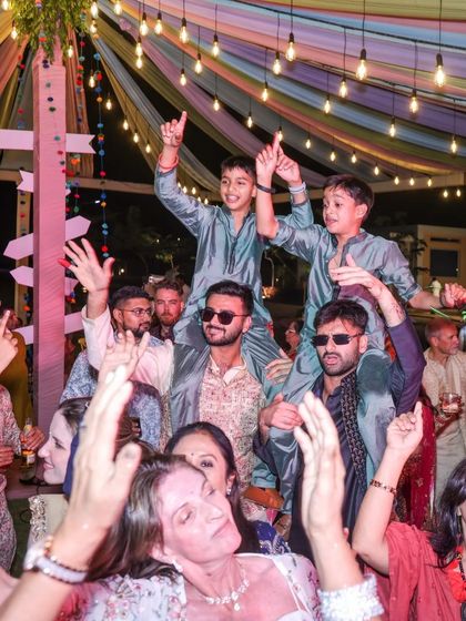 Crimson and Cherry - Full-Service Wedding Planning & Execution Vibrant Sangeet & Mehendi Nights photo 40