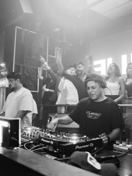 A black and white shot from Fingerprint, Mumbai. The focus is on the music and the connection with the crowd.