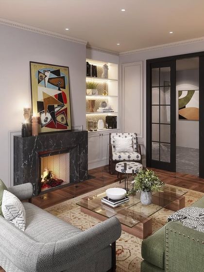 This cozy den is a perfect example of how to play with prints and patterns. I used French pocket doors, intricate cornices, and a show-stopping fireplace with handcrafted chevron bricks to create a balanced and harmonious space for relaxation.