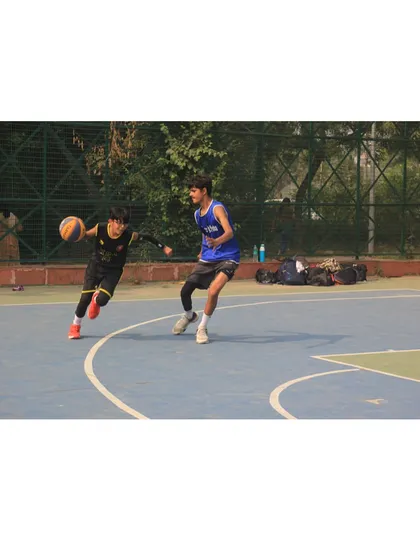 This is what I call hustle. A player driving hard to the basket against a defender in a game situation. This is why we play.