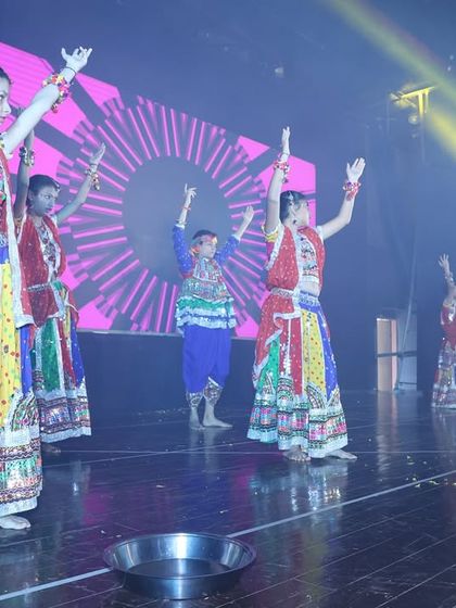 A candid shot from our Garba performance, capturing the joy and energy of the dancers as they move through the choreography.