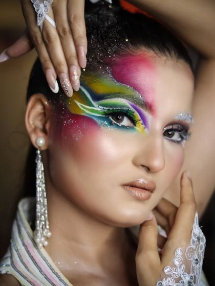A vibrant, multi-colored fantasy look, perfect for a themed party or creative photoshoot.