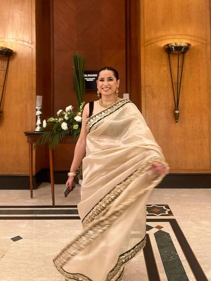 Here I am, styling myself for my sister's wedding. I chose this stunning silk tissue saree from a homegrown Banaras brand, pairing it with gold jewellery for a look that was both traditional and comfortable.