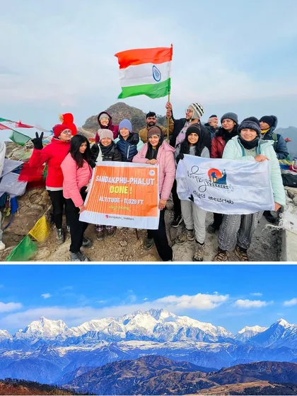 Mission accomplished! Our happy group at the Sandakphu summit, holding the Indian flag high with the "Sleeping Buddha" range of peaks in the background. This is a moment of pure pride and joy.