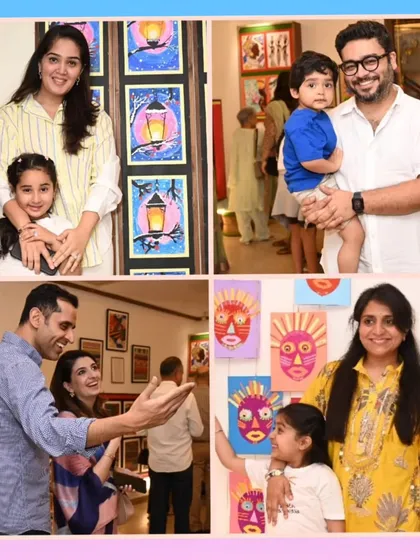 Proud families pose with their young artists and their work. The exhibition is a wonderful opportunity to celebrate each student's achievements and creative journey.