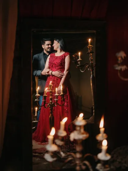 A reflection of romance, lit by candlelight. This image showcases our ability to create a dramatic, moody, and cinematic atmosphere for a truly glamorous pre-wedding look.