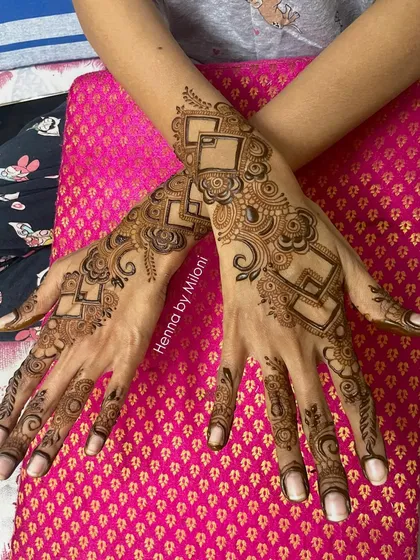 A modern, geometric design with floating squares and floral elements, perfect for someone who wants a unique and contemporary look.