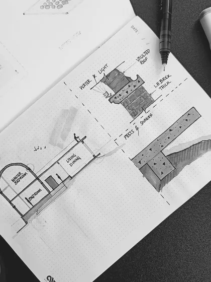 Every project begins with a simple sketch. This hand-drawn detail explores how to use vaulted roofs and natural materials to shape light and space, capturing the initial spark of an idea that will grow into a fully realized building.