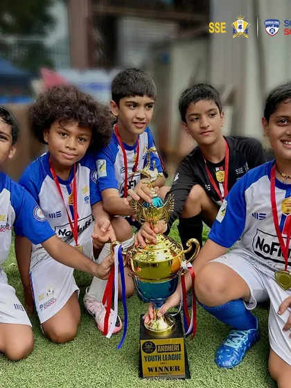 Our U11 squad celebrating with the trophy after winning the Andheri Youth Cup. Their teamwork and fighting spirit were on full display.