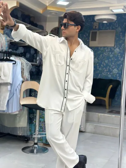 A mirror selfie in the custom white co-ord set. The reflection shows how the outfit looks from all angles, highlighting the perfect fit and clean lines.