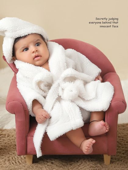 This little one is ready for a day of pampering. Themed shoots like this are a playful way to capture your baby's personality.