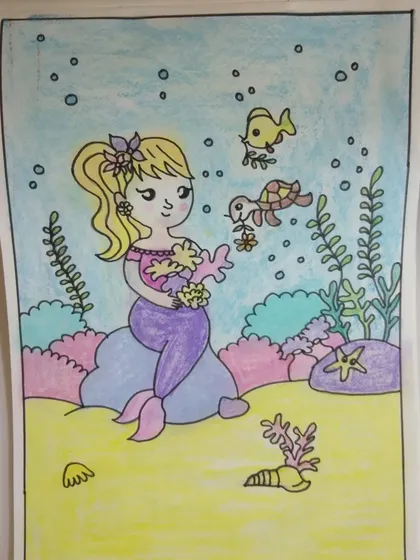 A beautiful mermaid drawing from our juniors corner, full of soft pastel colors.