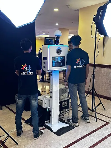 My team operating the photo booth at the Mumbai Cricket Excellence Awards 2023. We use professional Godox lighting to ensure every photo is perfectly lit.