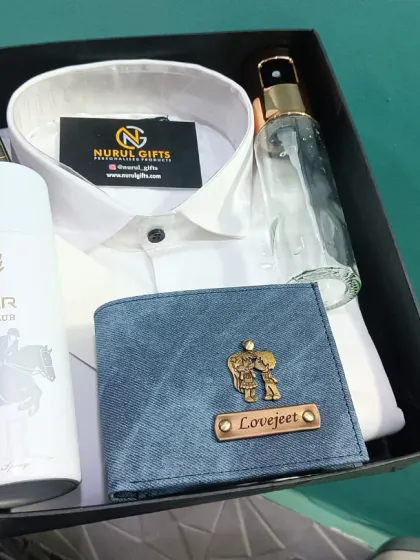 A closer look at the summer gift hamper, showcasing the personalized denim wallet, name-engraved pen, and other curated items.