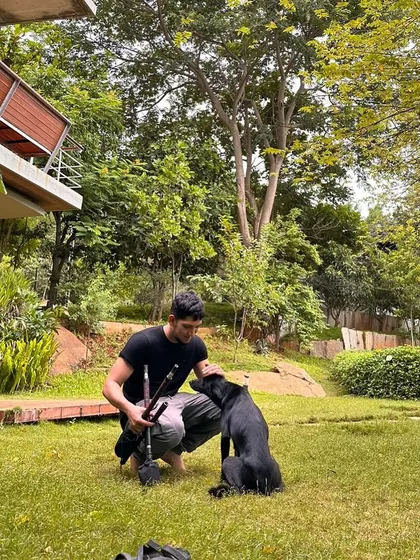 Taking a moment to hang out with a friendly dog before a practice session. Animals and nature are a big part of my life outside of performing.