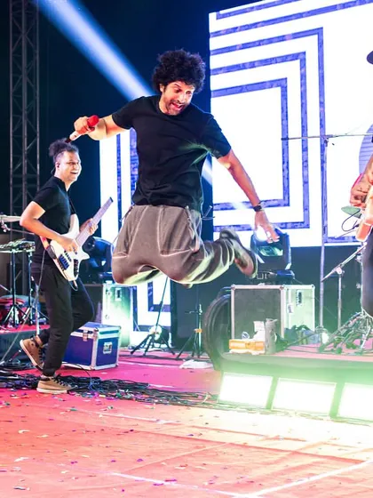 Pure joy and energy on stage. This is the vibe I bring to every show, jumping and jamming with the band to make sure the audience feels every single beat.