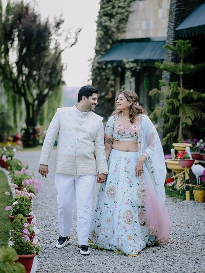 A happy, walking shot of the couple during their engagement in Nainital. These natural, in-motion photos capture the joy and excitement of the day perfectly.