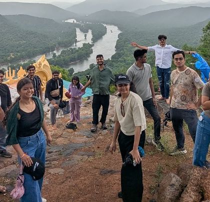 A group enjoying the scenic views on our Hogenakkal Falls trip. The landscape around the falls is as beautiful as the falls themselves.