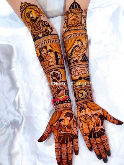 This intricate mehendi tells a multi-layered story, with portraits of the couple's family, a doli scene, and even a paw print to include a beloved pet.