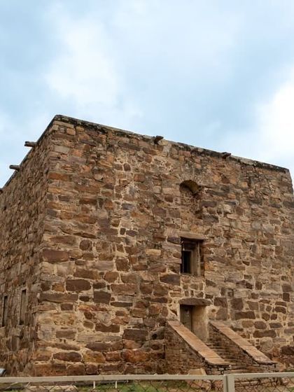 The ancient granary at Gandikota, a large stone building used to store food grains for the fort's inhabitants.