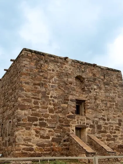 The ancient granary at Gandikota, a large stone building used to store food grains for the fort's inhabitants.