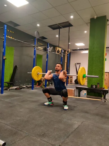 A person becomes great not by birth, but by their actions. A front squat, a foundational movement for building strength and stability.