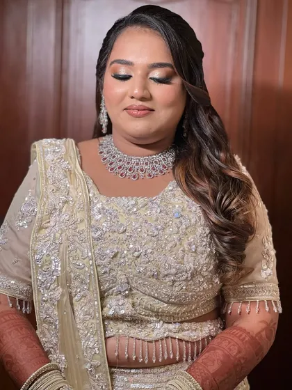 A close-up of the reception makeup, showing the blended smokey eye and flawless base.