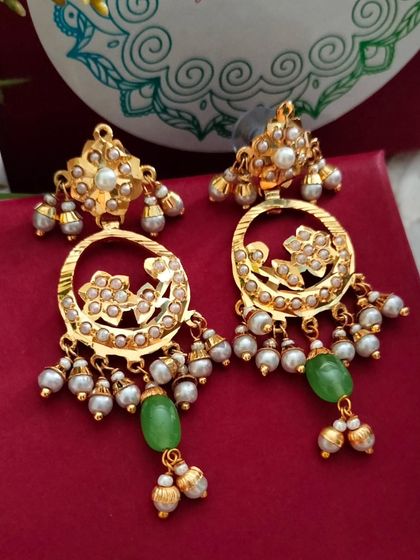 The earrings from the circular pendant set. They are lightweight and perfect for wearing on their own as well.