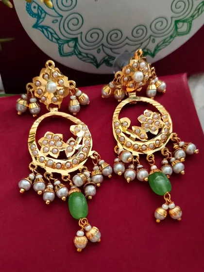 The earrings from the circular pendant set. They are lightweight and perfect for wearing on their own as well.