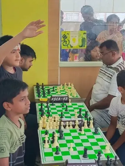 Players signal the completion of their game. Every match is a learning experience, regardless of the outcome.