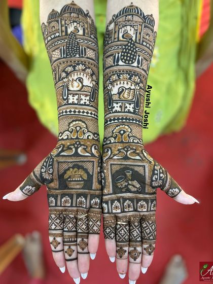 An intricate bridal design with a focus on traditional symbols like the dhol, shehnai, peacocks, and swans, perfect for a classic bride.