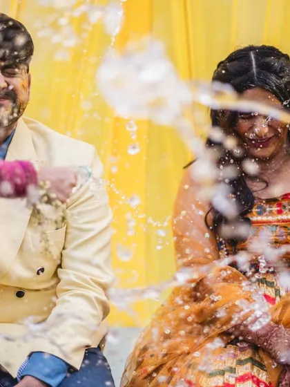 A champagne spray adds a modern and celebratory twist to this haldi ceremony.