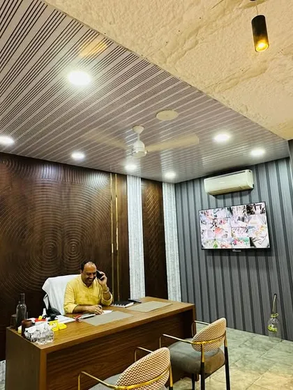 Our own office is a showcase of what's possible, featuring a combination of textured wall panels and a designer ceiling to create a modern and professional environment.