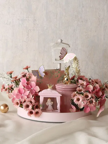 A gift of heaven for Mom. This beautifully curated hamper includes an angel showpiece, a box of brownies, cookies, and a rabbit jar filled with chocolates.