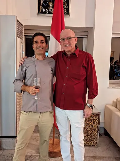 Chef Christophe with the Swiss Consul General after a successful wine and food pairing event. On the same night, our team was also catering the 750-pax Belgian King's Day, showcasing our capacity for handling multiple large events.